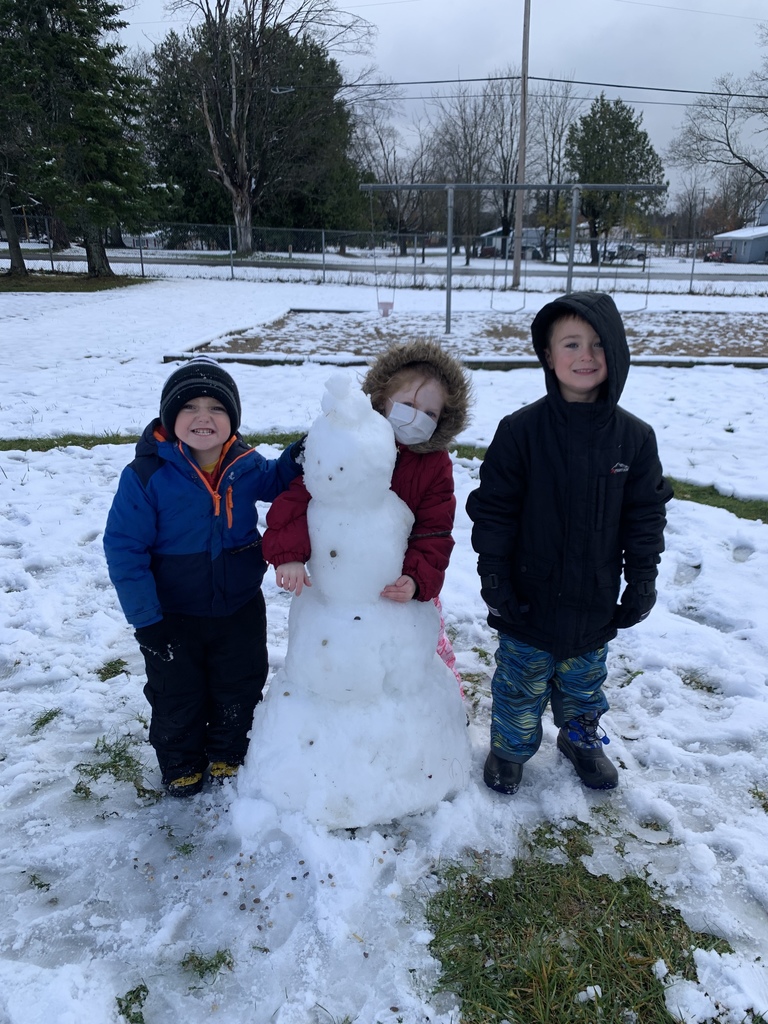 Kindergarten students make first snowman